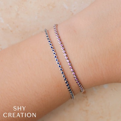 Shy Creation 14K White Gold 7" Bezel Set Tennis Style Bracelet Featuring Pink Sapphires