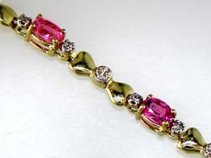 14K Yellow Gold 7" Bow Fancy Link Style Bracelet Featuring Sapphires and Diamonds