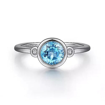 Sterling Silver .93ctw Three Stone Style Blue Topaz and Diamond Ring